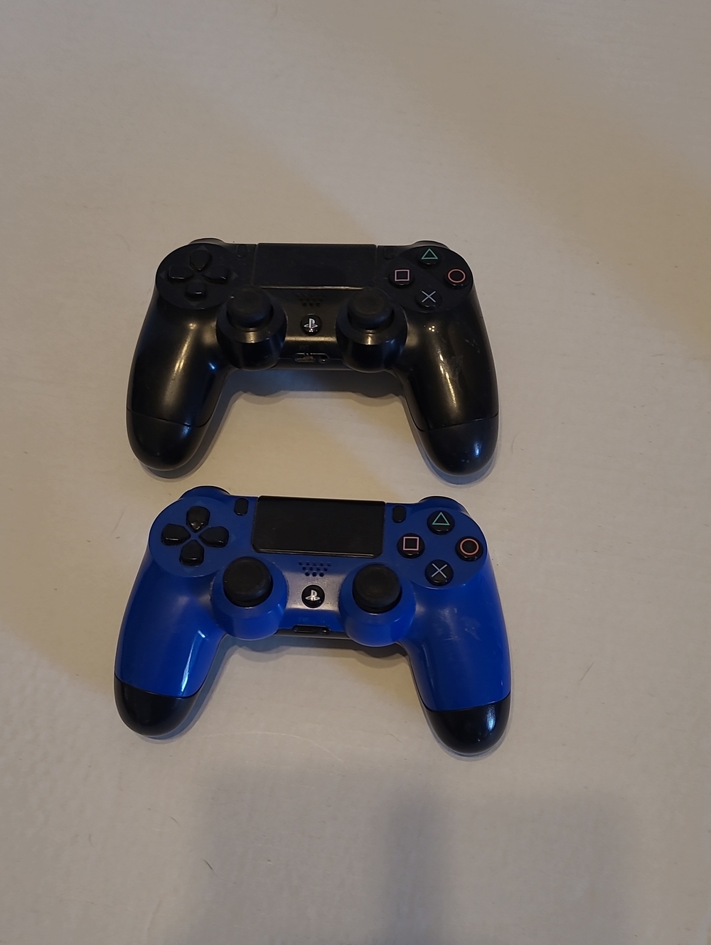 Sony PLAYSTATION Controllers - Black & Blue